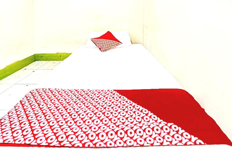 Spot On 91500 Suci Homestay Syariah - Oda