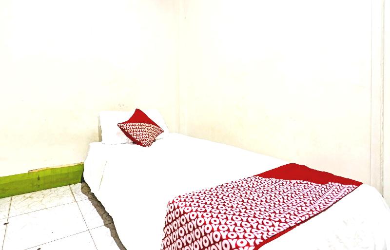Spot On 91500 Suci Homestay Syariah - Oda