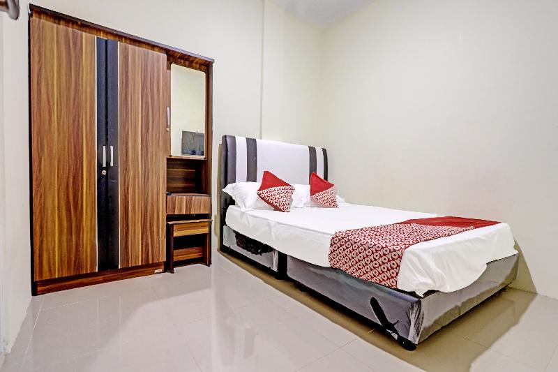 Spot On 91500 Suci Homestay Syariah - Oda