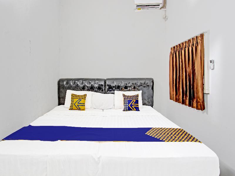 Spot On 91523 Kenari Guesthouse - Oda