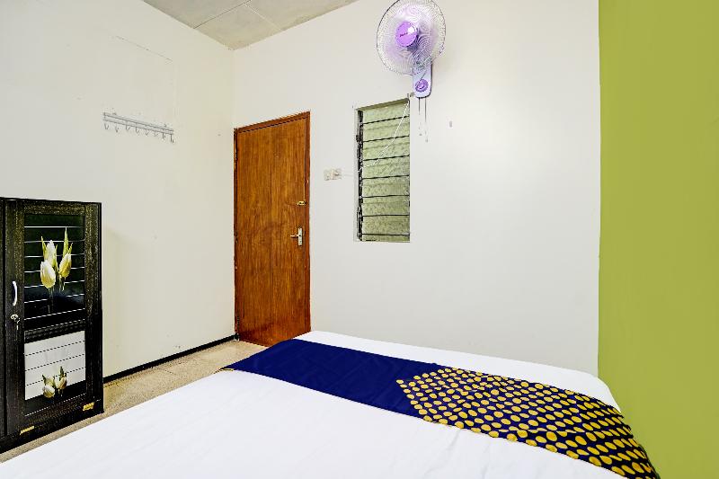 Spot On 91716 Kost Yy Syariah - Oda