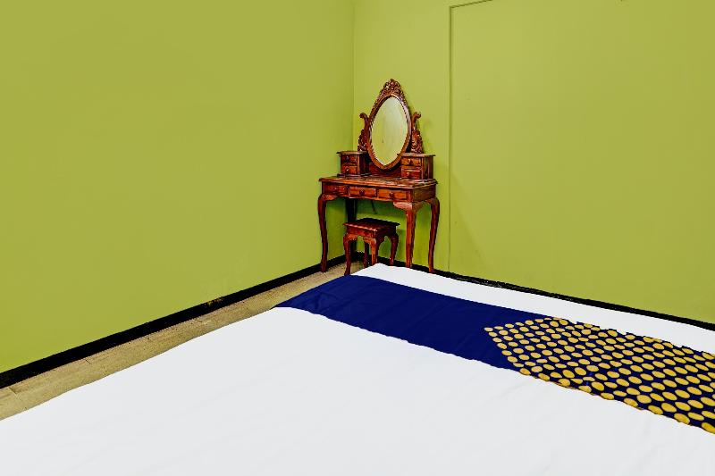 Spot On 91716 Kost Yy Syariah - Oda