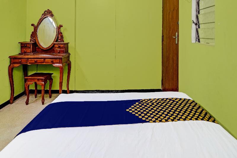 Spot On 91716 Kost Yy Syariah - Oda