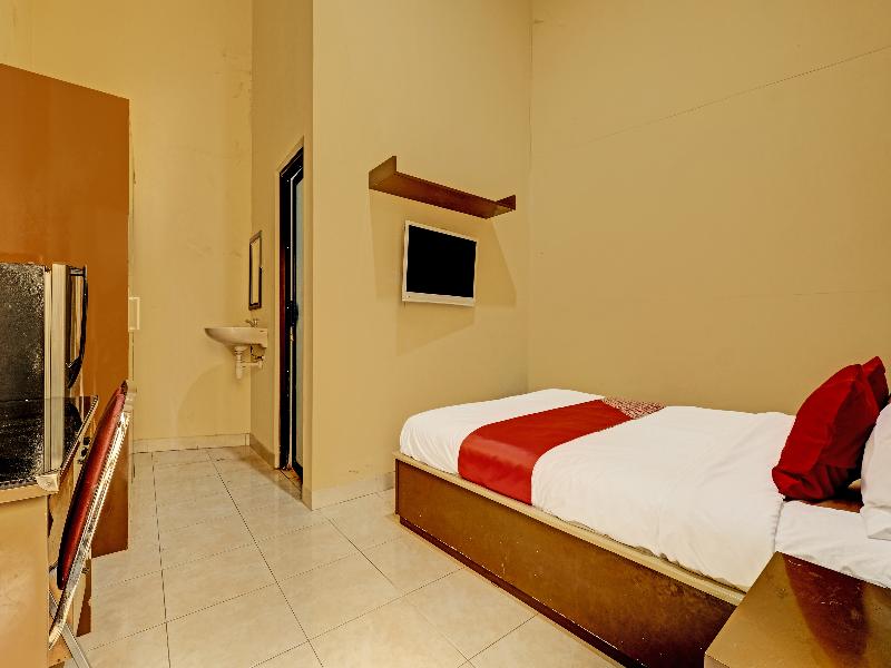 Oyo 91522 Candi Gebang Guesthouse - Oda