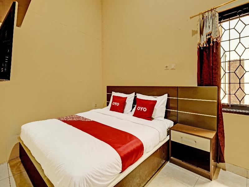 Oyo 91522 Candi Gebang Guesthouse - Oda