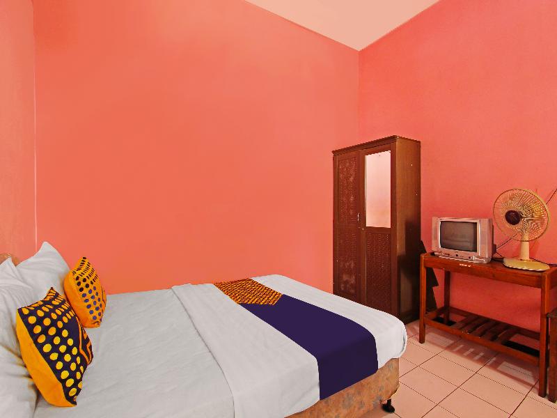 Spot On 91563 Hotel Meilias - Oda