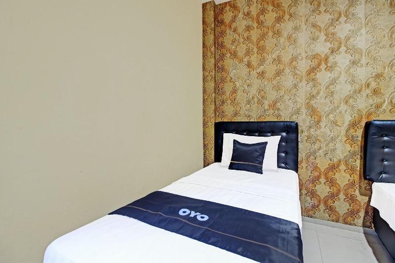 Collection O 91666 Meyli Guesthouse - Oda