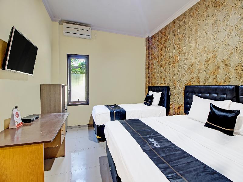 Collection O 91666 Meyli Guesthouse - Oda