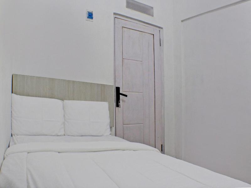 Spot On 91504 De Vila Ungu Syariah - Oda