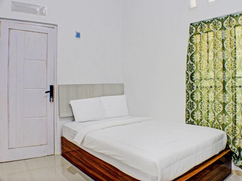 Spot On 91504 De Vila Ungu Syariah - Oda