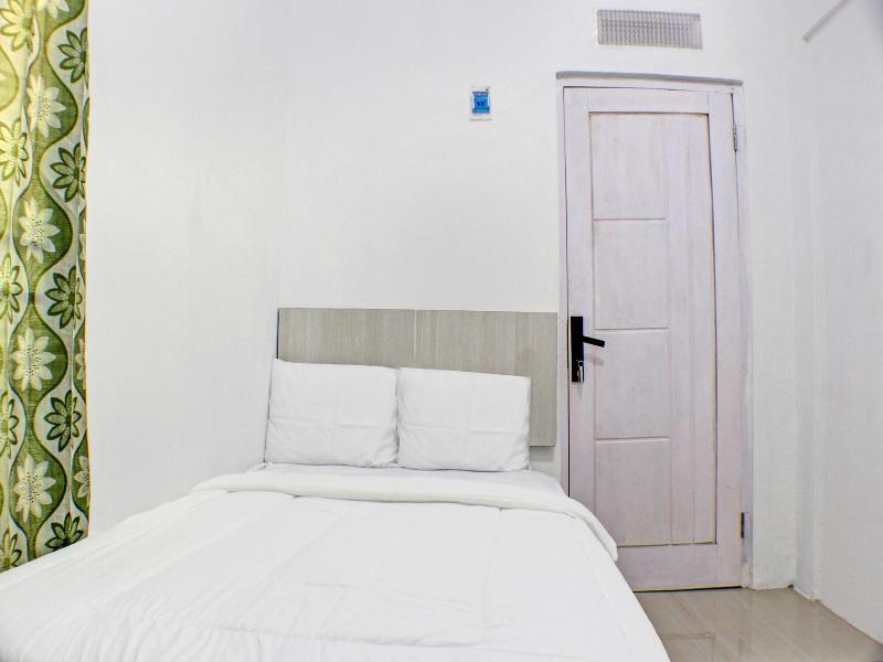 Spot On 91504 De Vila Ungu Syariah - Oda