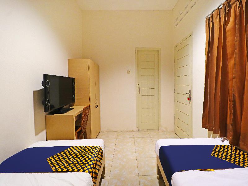 Spot On 91504 De Vila Ungu Syariah - Oda