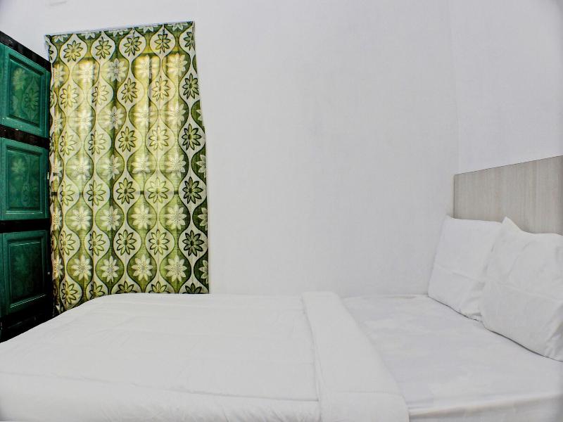 Spot On 91504 De Vila Ungu Syariah - Oda