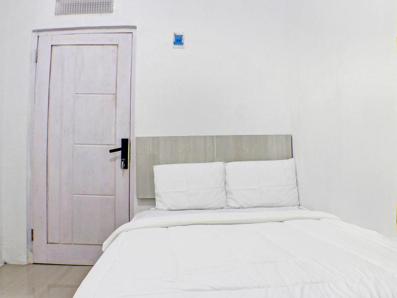 Spot On 91504 De Vila Ungu Syariah - Oda