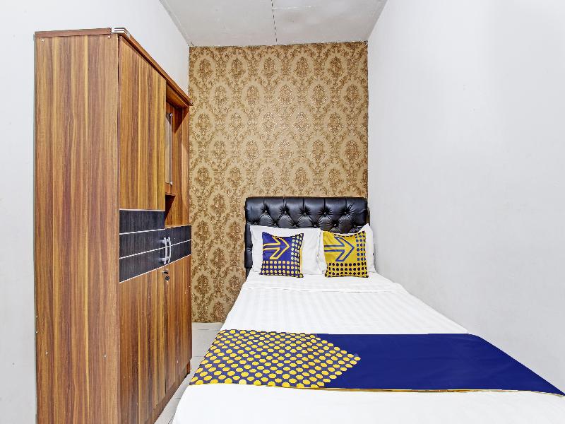 Spot On 91521 Mayong Guesthouse - Oda