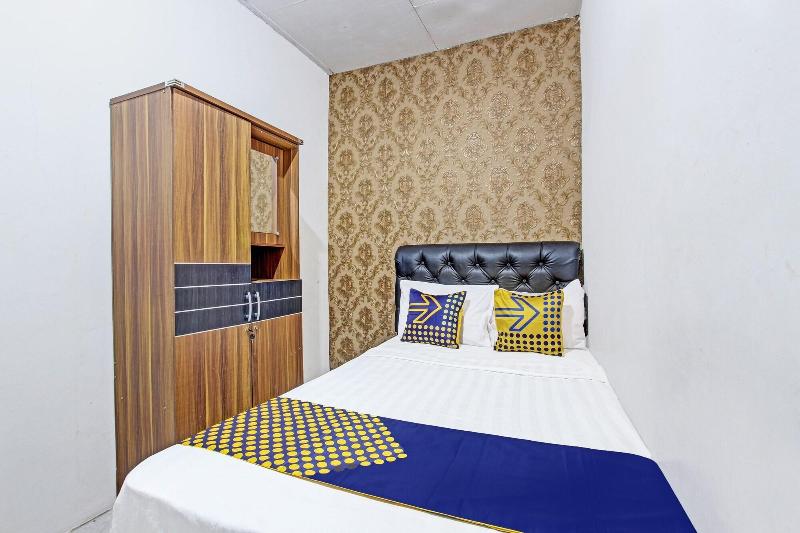 Spot On 91521 Mayong Guesthouse - Oda