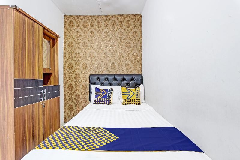 Spot On 91521 Mayong Guesthouse - Oda
