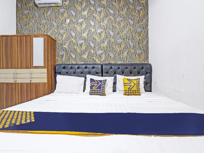 Spot On 91521 Mayong Guesthouse - Oda