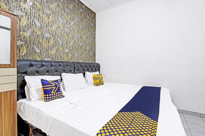 Spot On 91521 Mayong Guesthouse - Oda