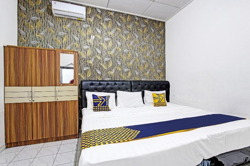 Spot On 91521 Mayong Guesthouse - Oda