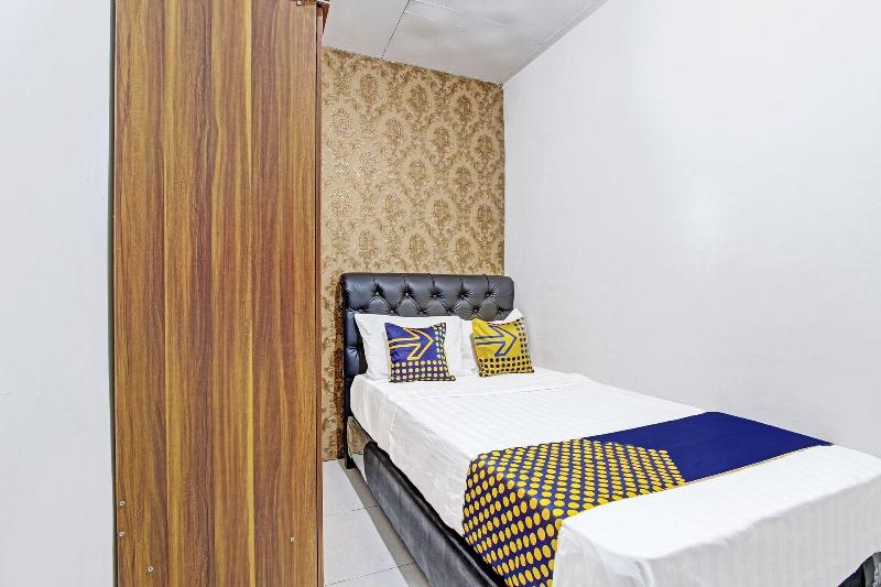 Spot On 91521 Mayong Guesthouse - Oda