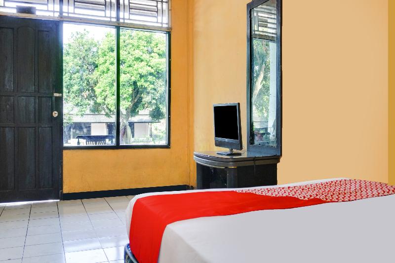Spot On 91797 Mutiara Guest House - Oda