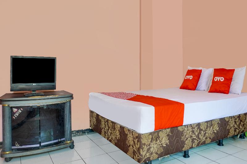 Spot On 91797 Mutiara Guest House - Oda