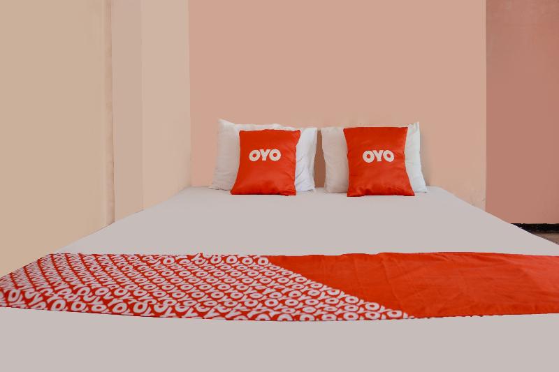 Spot On 91797 Mutiara Guest House - Oda