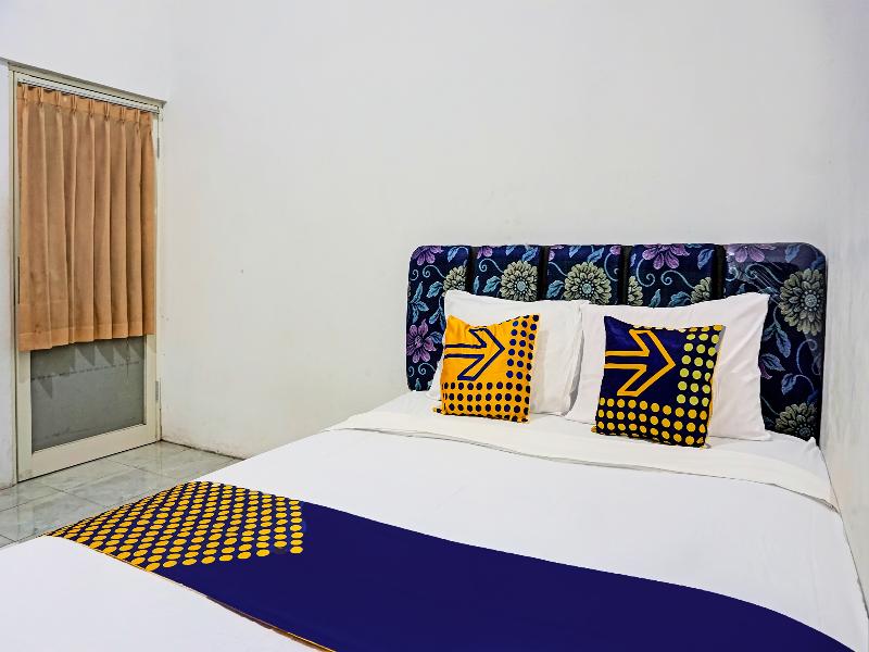 Spot On 91718 Kost Damai Syariah - Oda