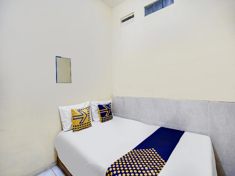 Spot On 91774 Kost Nusantara Sidoarjo - Oda