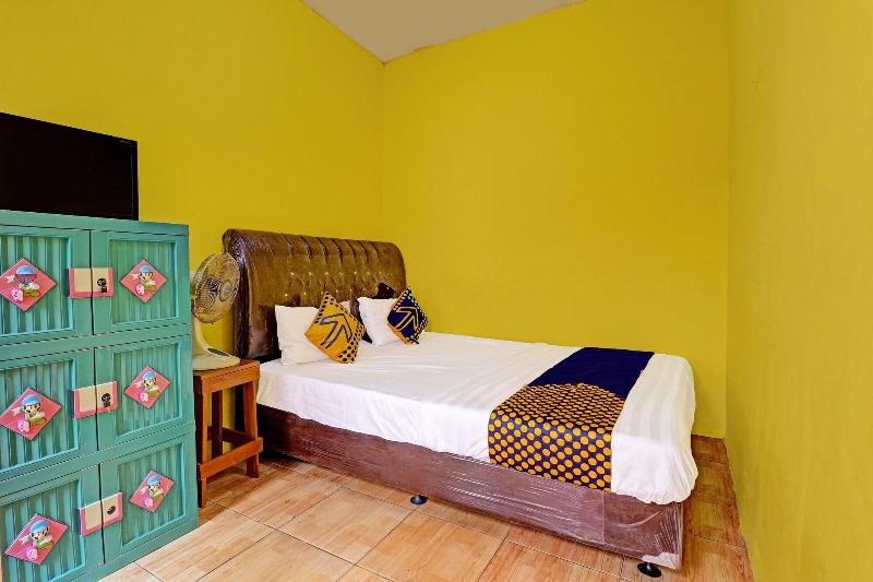 Spot On 91478 Wisma Aura Syariah - Oda