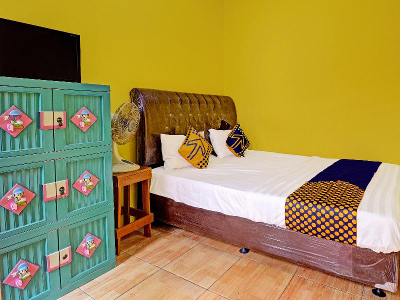 Spot On 91478 Wisma Aura Syariah - Oda