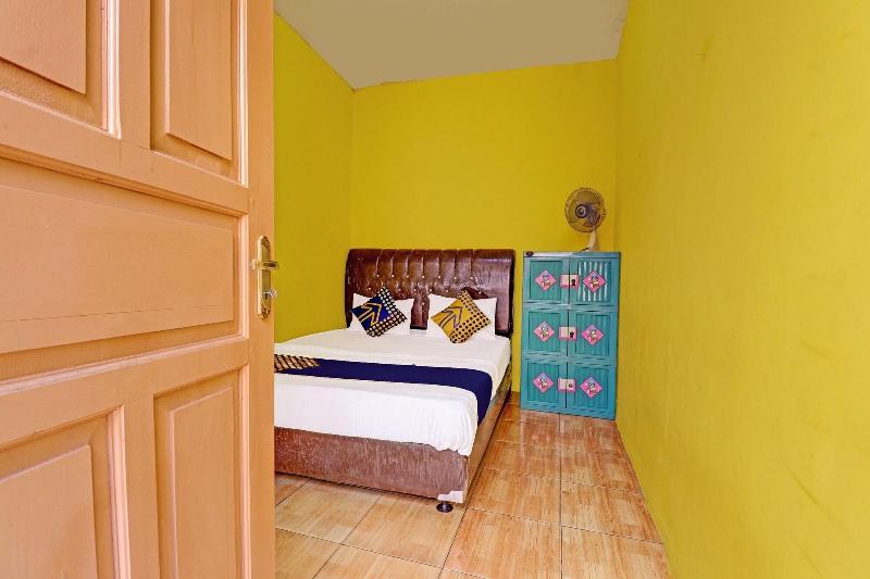 Spot On 91478 Wisma Aura Syariah - Oda