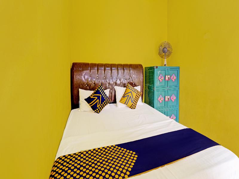 Spot On 91478 Wisma Aura Syariah - Oda