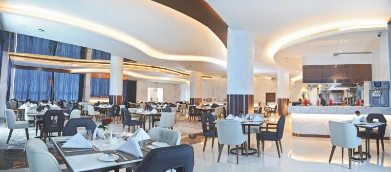 Royal M Al Aqah Beach Hotel And Resort by Gewan - Restoran