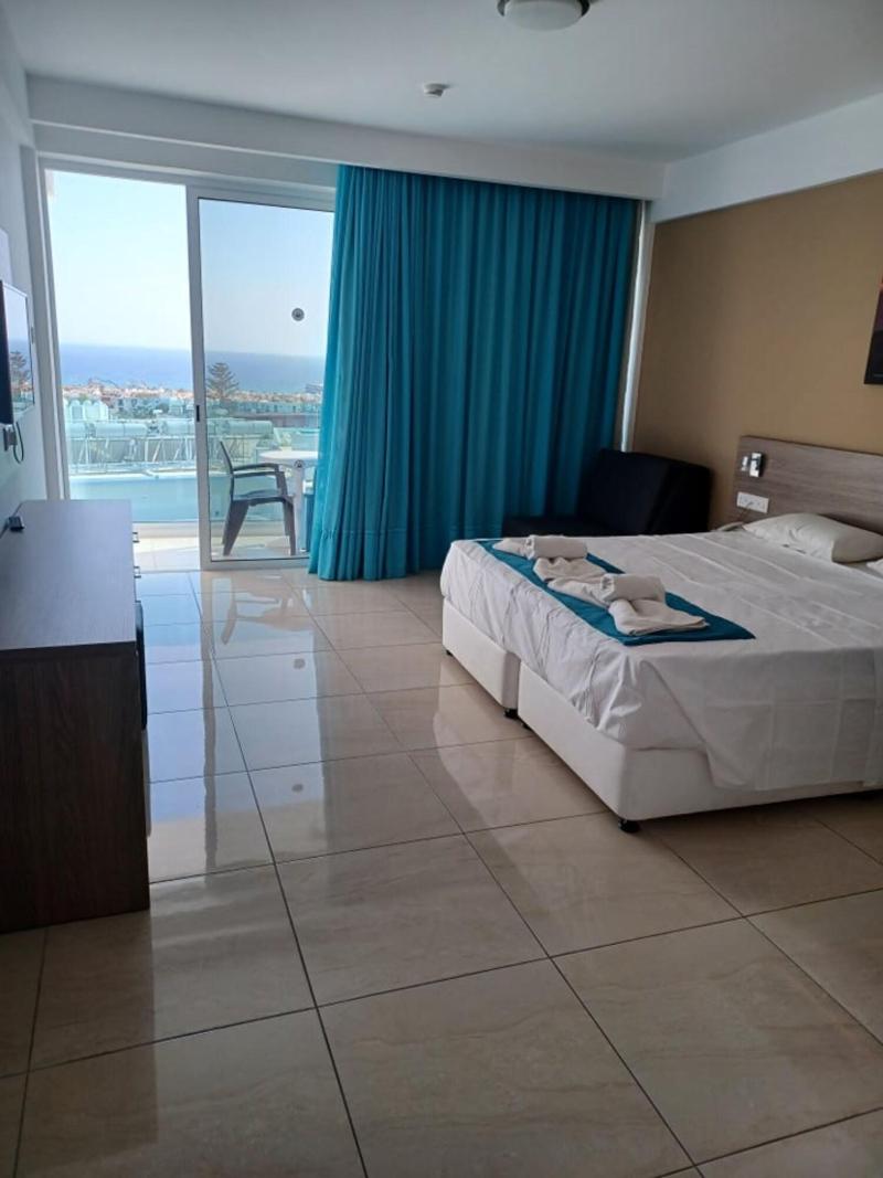 Sunny Blue Hotel - Oda