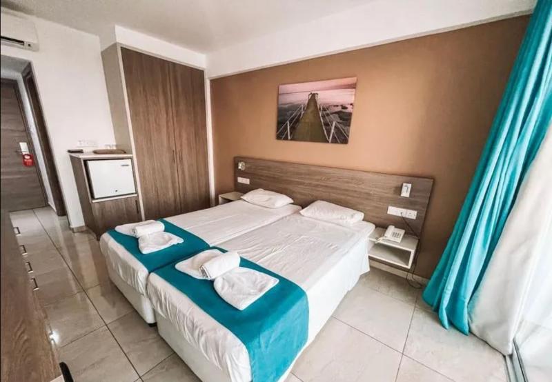 Sunny Blue Hotel - Oda