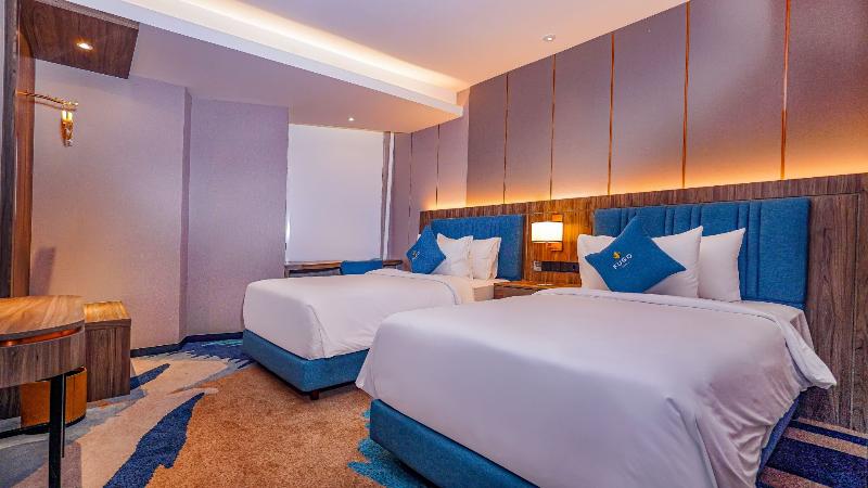 Fugo Hotel Samarinda - Oda
