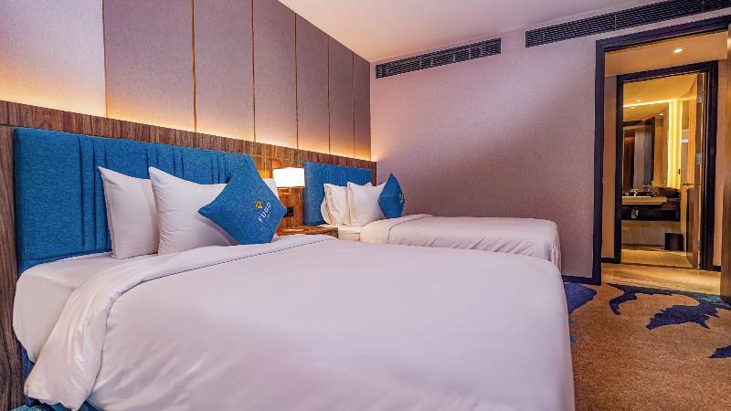 Fugo Hotel Samarinda - Oda