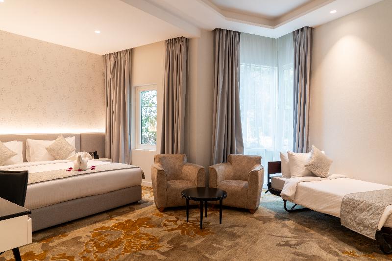 E-Stay Hotel - Oda