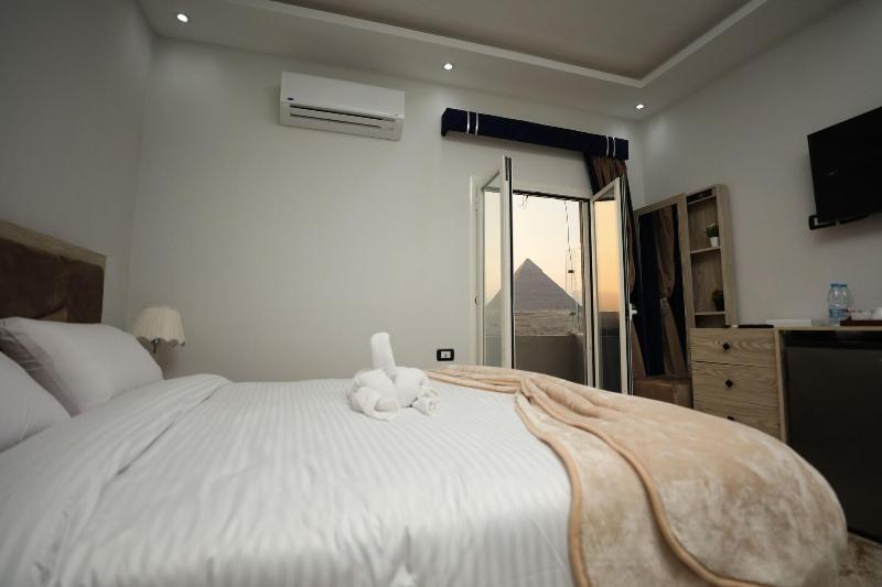 Capital Of Pyramids Hotel - Oda