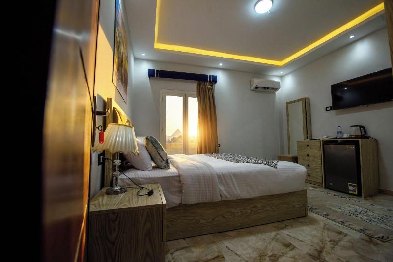 Capital Of Pyramids Hotel - Oda