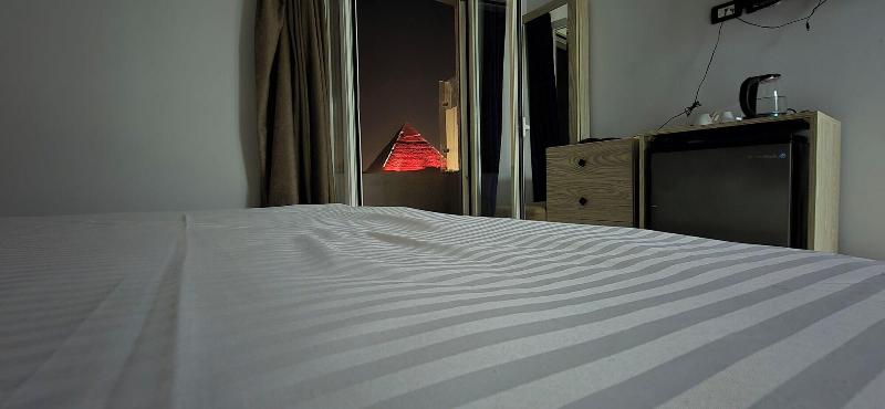 Capital Of Pyramids Hotel - Oda