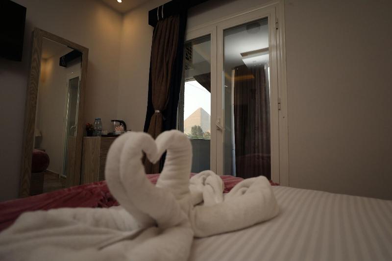 Capital Of Pyramids Hotel - Oda