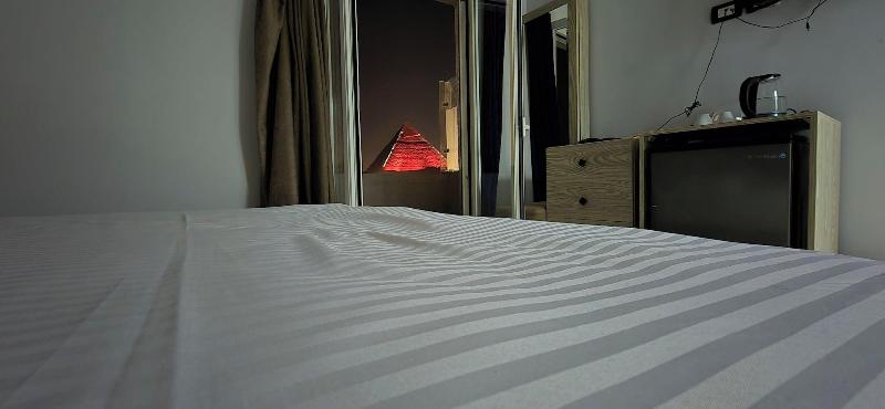 Capital Of Pyramids Hotel - Oda