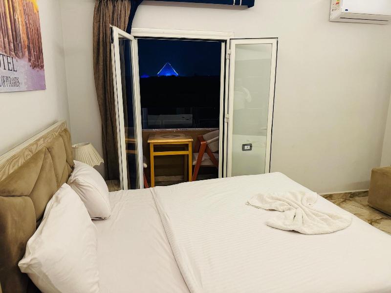 Capital Of Pyramids Hotel - Oda