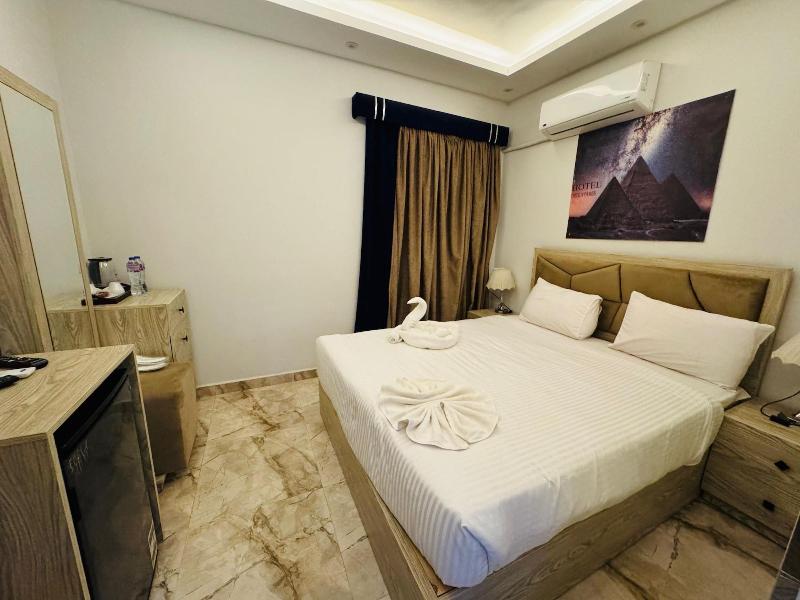 Capital Of Pyramids Hotel - Oda