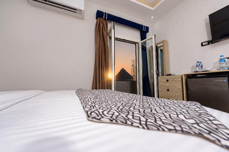 Capital Of Pyramids Hotel - Oda