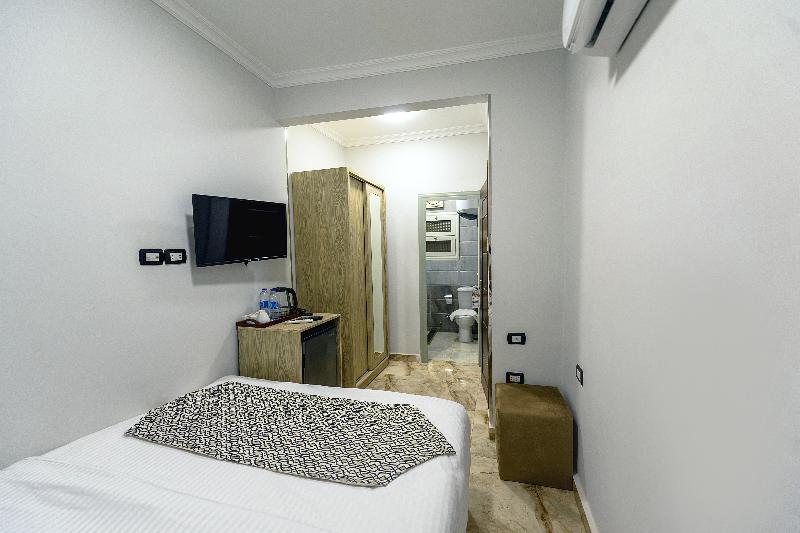 Capital Of Pyramids Hotel - Oda