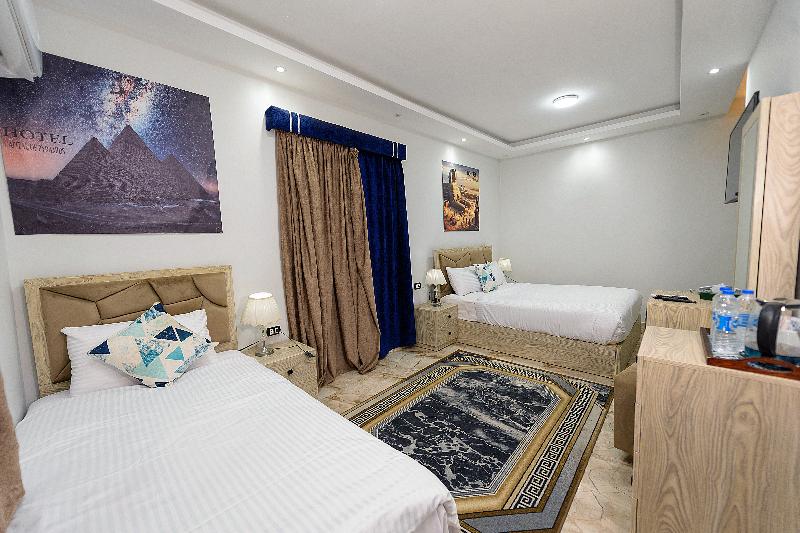 Capital Of Pyramids Hotel - Oda